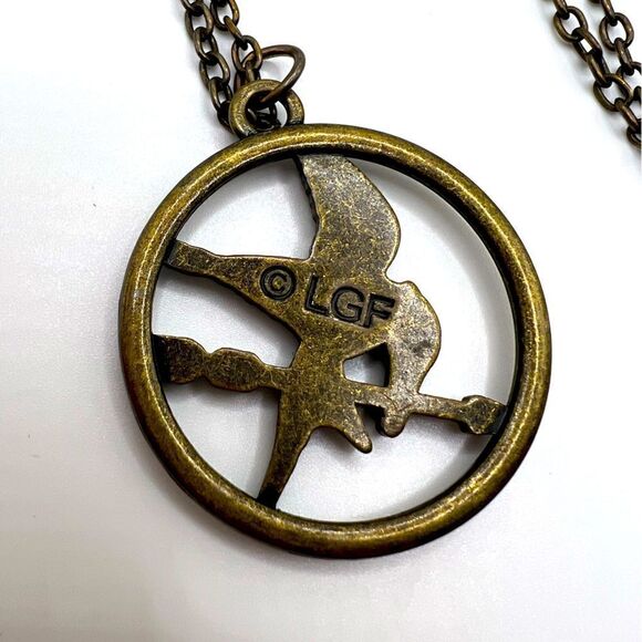 *3/$20* Hunger Games Mockingjay bronze tone necklace - Picture 3 of 3